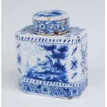 A Delft blue and white tea caddy, 19th century, decorated with a reclining lady, marked for