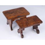 A 19th century burr elm small stool / candle stand, the rectangular top on shaped trestle end