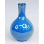 A Dutch Uterecht St Lukas blue lustre art pottery vase, 20th century, of globular form, printed