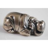 A Russian hollow silver figure of a hippopotamus, having red gem set eyes, bearing Faberge eagle