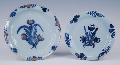 A Lambeth polychrome delftware plate, circa 1725, decorated with flowers in cobalt and manganese,