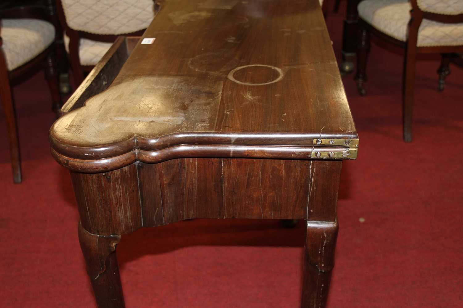 An early George III mahogany card table, the fold-over top with proud and dished corners, and - Image 8 of 14