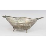 An early 20th century Dutch openwork silver bread basket, of elliptical form with a wavy beaded