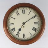 A Victorian oak cased wall clock, having a repainted circular white enamel 11" dial, single