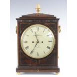Thomas Restell of Tooting - a Regency rosewood cased bracket clock, the case having a pineapple