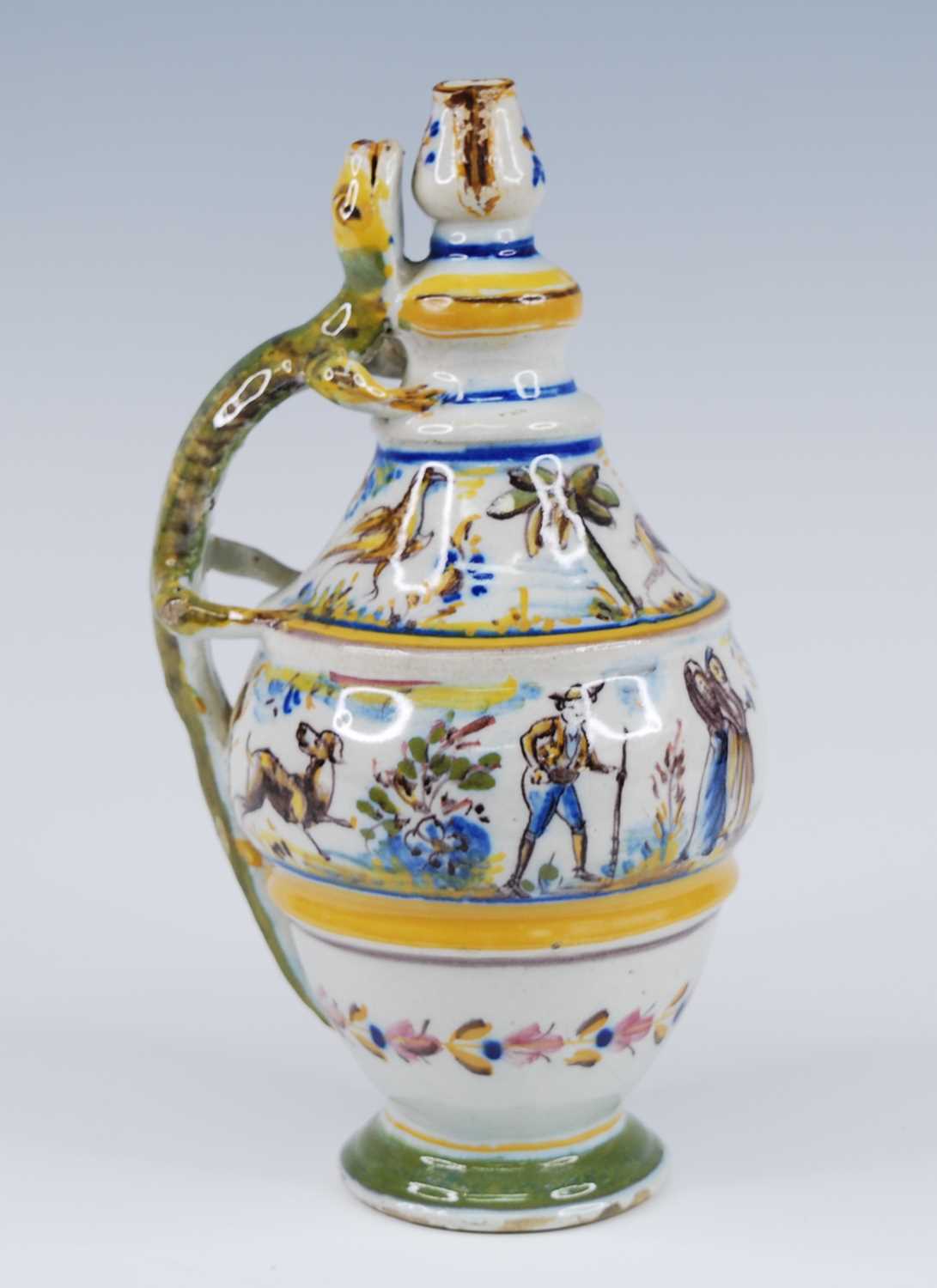 A Spanish grotesque polychrome glazed earthenware oil bottle, probably Alcora, 19th century, the - Image 2 of 4