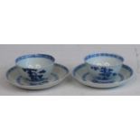 A pair of Chinese blue and white porcelain tea bowls and saucers, circa 1750, decorated with