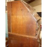 A William IV mahogany twin pedestal inverted break-front sideboard, having a raised back, the