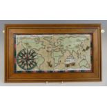 A Cobridge Stoneware framed plaque decorated with a map of the world, impressed and painted marks,