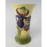 A circa 1930s Moorcroft pottery vase in the Orchid pattern, of waisted cylindrical form,