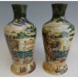 A pair of large Cobridge Stoneware Wartime Harvest pattern vases, the slender necks of slightly