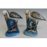 A pair of contemporary Moorcroft pottery models of Heron, underglaze painted and tube-line
