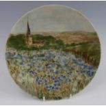 A Cobridge Stoneware plate in the Pyghtle pattern, underglaze painted, designed by Rachel Bishop,