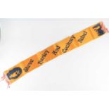 Steve Harley + Cockney Rebel, a 1970's fan club sash/scarf in orange fabric printed with an image of