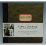 Woody Guthrie - American Radical Patriot, box-set comprising of 6 CD's, DVD and 10" vinyl, Rounder