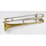 A Lincoln brass trombone, distributed by Selmer, in a felt lined leather case, together with a
