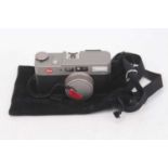 A Leica CM Zoom camera, No.2968047, with strap, in Leica felt pouch