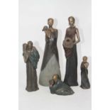 A collection of five Soul Journey's figures, each in the form of an African tribeswoman or child,
