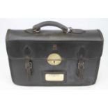A 1970s black leather satchel with gilt tooled ER cypher, and brass Chubb lock