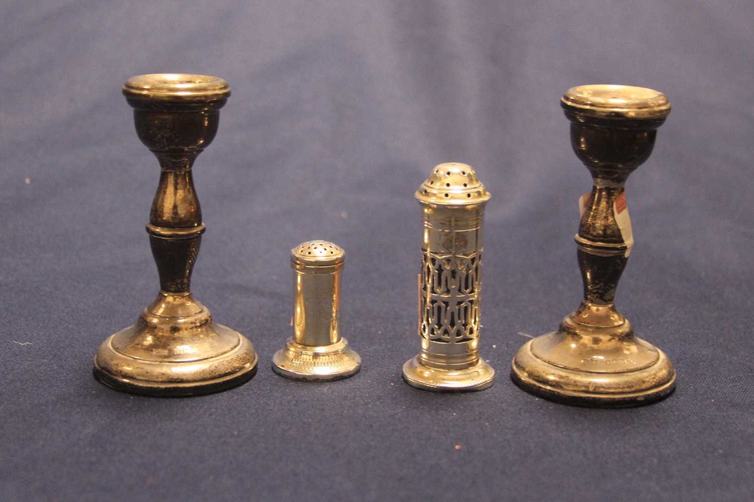 A pair of Elizabeth II silver dwarf candlesticks, Birmingham, 197 (loaded), height 10cm, together