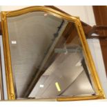 A reproduction gilt composition framed and bevelled wall mirror, 90 x 69cm