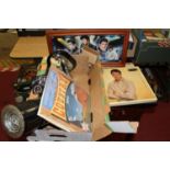 A tray of Elvis related memorabilia, to include LPs and other records, diecast figures, lamps etc