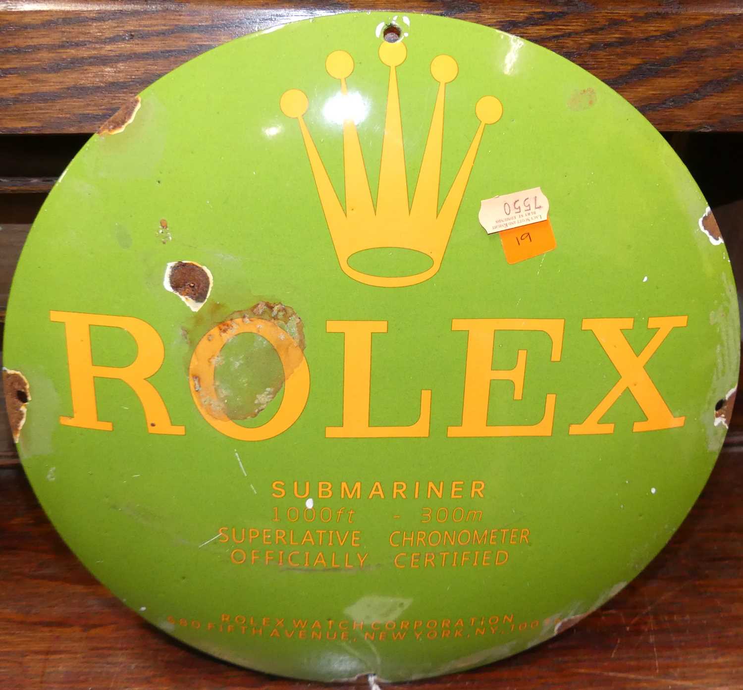 A convex enamel sign advertising watches, dia.30cm
