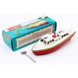 A Sutcliffe tinplate and clockwork Jupiter Ocean Pilot Cruiser boat, comprising red hull with