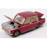 Asahi Toys ATC (Model Pet) 1/42nd scale No. 30 Mazda Familia comprising a metallic red body, with an