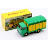 French Dinky Toys No. 577, Berliet Livestock Trailer, yellow and green body with yellow hubs,