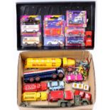 2 trays containing a collection of mixed diecasts, with examples including a Siku Ford Sierra, a