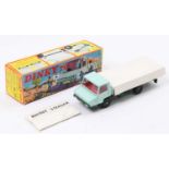 French Dinky Toys No. 569 Berliet Open Back Tipper Truck comprising a turquoise cab and back, dark