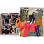 2 trays containing a collection of vintage Palitoy Action Man clothing and accessories, with