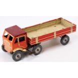 Mettoy (UK) tinplate clockwork articulated lorry, with orange, cream & red body, with grey balloon