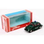 A Tekno No. 819 Polizei Volkswagen police car comprising of dark green body with red interior and