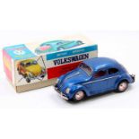 A KO Toys of Japan tinplate and battery operated model of a mystery action Volkswagen Beetle, housed