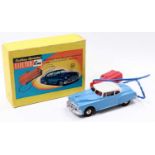 A Marx Toys battery operated Electric Car, comprising a blue and white car, with telesteering cable,