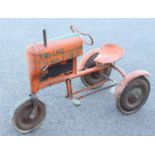 A Triang Major tractor large pressed steel and tin three-wheel pedal tractor, finished in orange