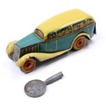 A Tipp Co or similar maker German-made tinplate and clockwork single deck bus comprising a blue