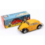 A Tekno 819 Volkswagen Saloon Beetle PTT comprising yellow and black body with white interior and
