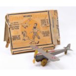 Girard Toys, 1921 tinplate and clockwork mechanical airplane, comprising grey body with yellow