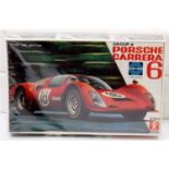 A Bandai 1/32 scale plastic kit for a Group 6 Porsche Carerra 6 housed in the original shrink