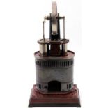 Carette Model Number 686/3, circa 1911 hot air engine, spirit fired of vertical formation comprising