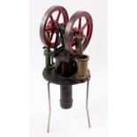 Heinrici of Germany vertical hot air engine water pump, comprising twin spoked flywheels measuring 5