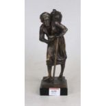 A reproduction bronze figure of a water-carrier, mounted upon a black polished hardstone plinth, h.