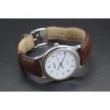 A gents Tissot PR50 steel cased quartz wrist watch, case dia. 34mm on a snakeskin bracelet