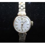 A ladies Cyma Cymaflex 9ct gold cased bracelet watch having manual wind movement, 15.9g, case dia.