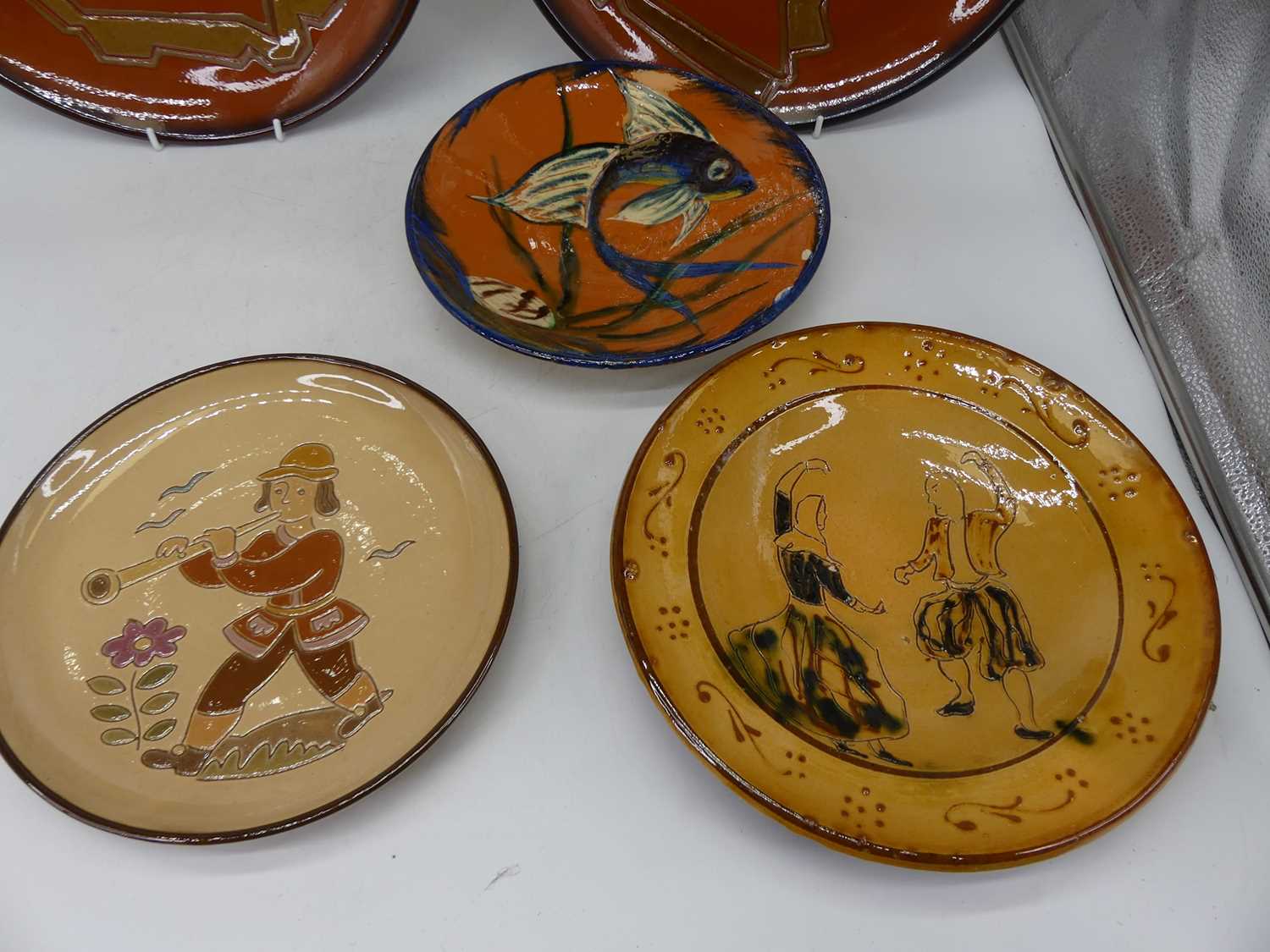 A 20th century continental studio pottery plate, incised with a musician, indistinctly signed verso, - Image 4 of 7