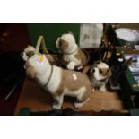 A collection of four resin models of bulldogs