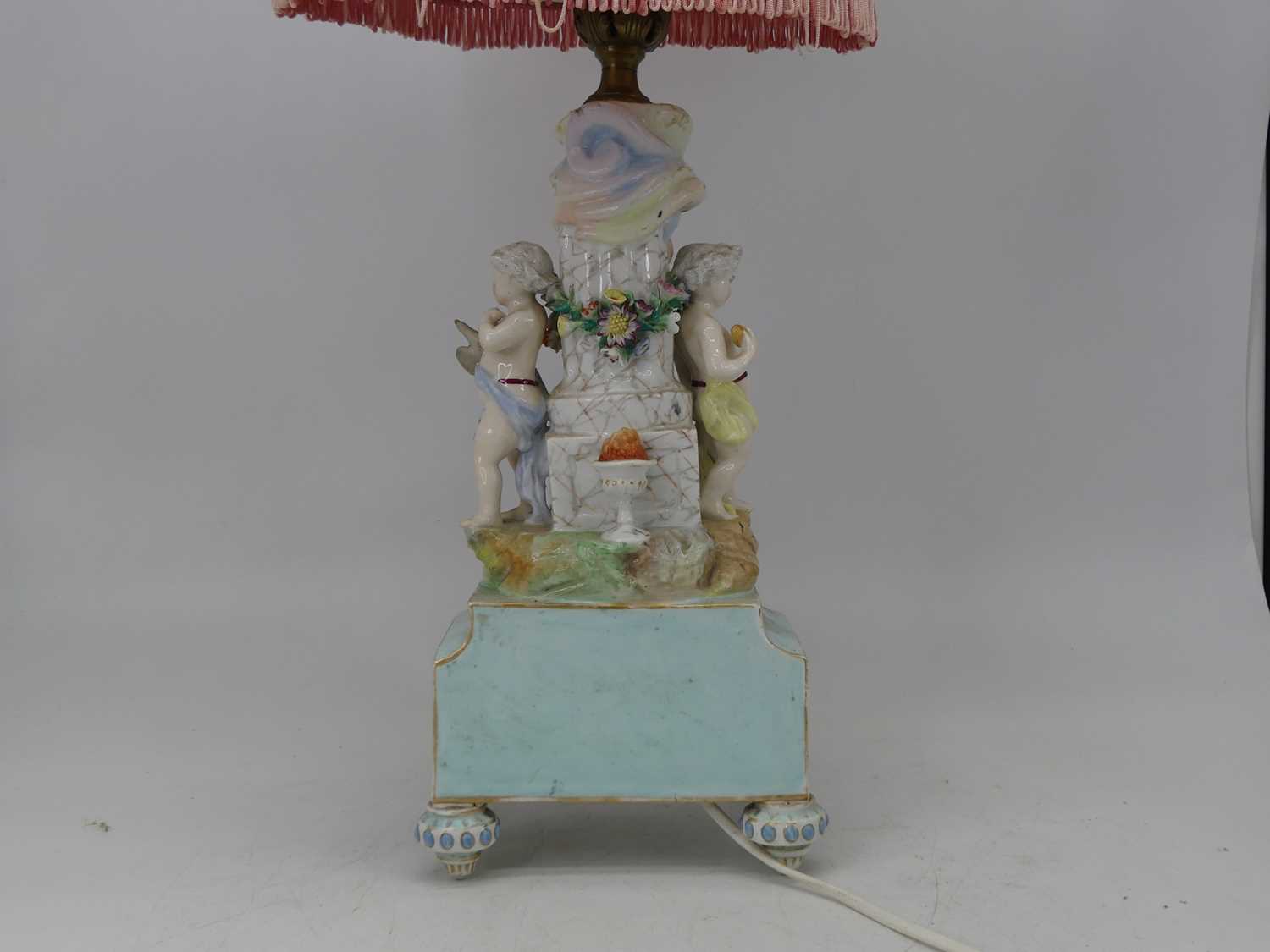 An early 20th century Dresden porcelain table lamp, the single gilt metal sconce on a fluted - Image 3 of 3